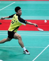 Chen Long returning badminton shot.